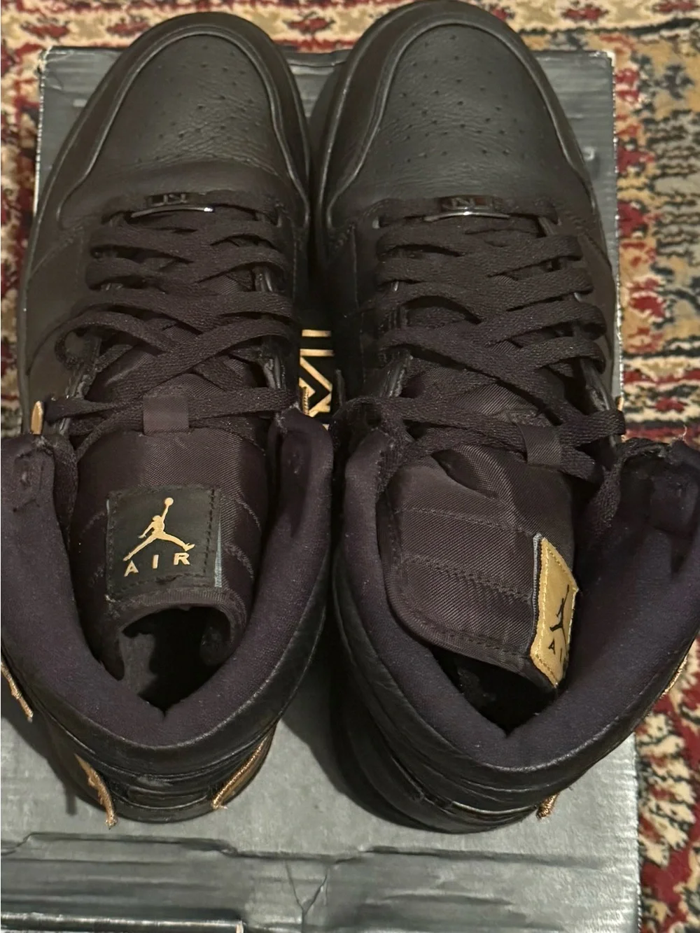Jordan 1 Retro BHM - Men's High Top Sneakers in Black with Gold Swoosh